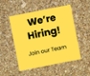 yellow stick note says We're Hiring!